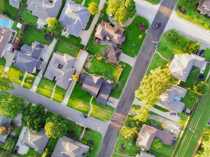 Aerial view of a green suburban neighborhood